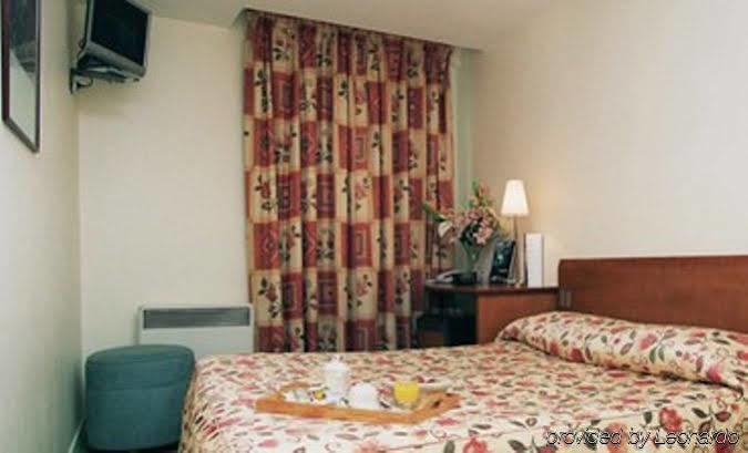 Hotel Le Montana Paris Værelse billede